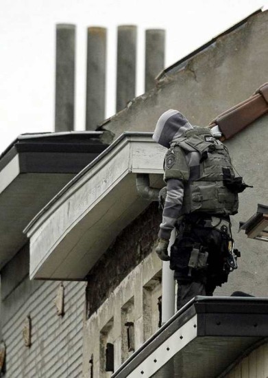 Aðgerðir belgísku lögreglunnar á Rue Delaunoy í Molenbeek